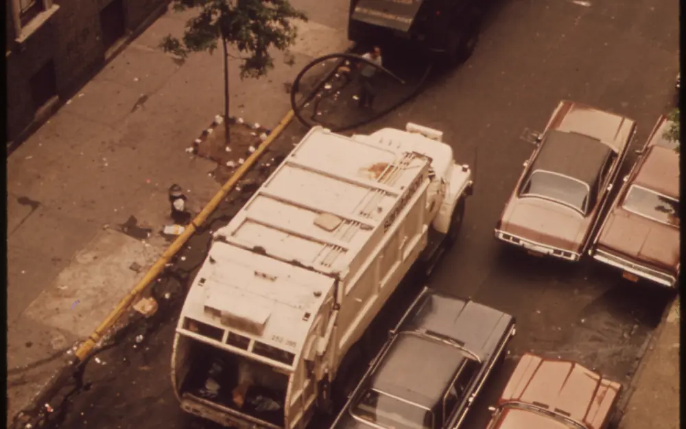 Cars parked on a residential street, illustrating vehicle theft exposure and comprehensive coverage in Portland